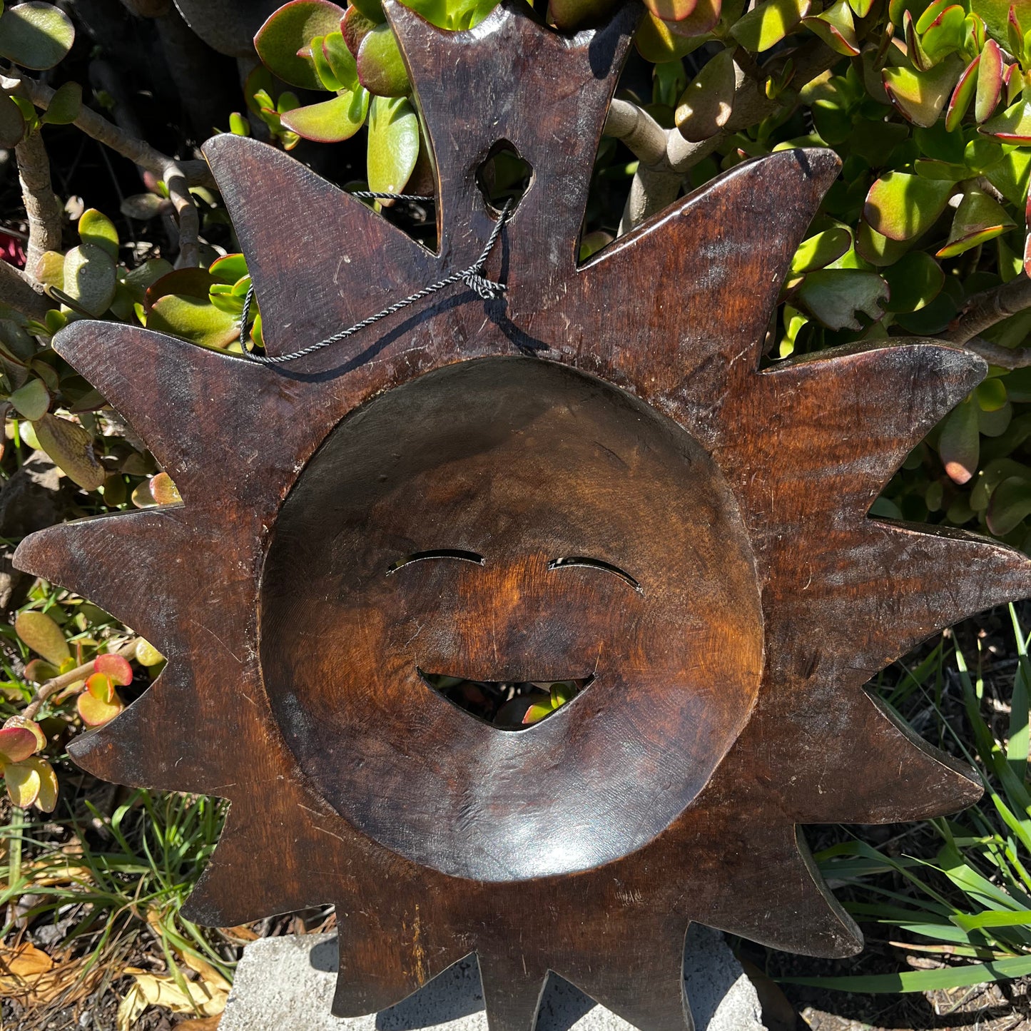 Bring sunshine and smiles indoors with our Happy Face Wall Decor – a beautifully hand-carved wood sun that adds warmth, charm, and a cheerful vibe to any room.