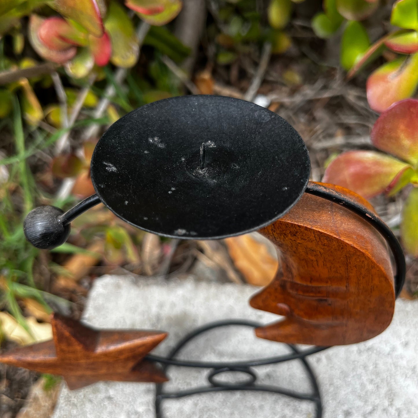 Handcrafted wooden candle holder showcasing natural craftsmanship and rustic charm.