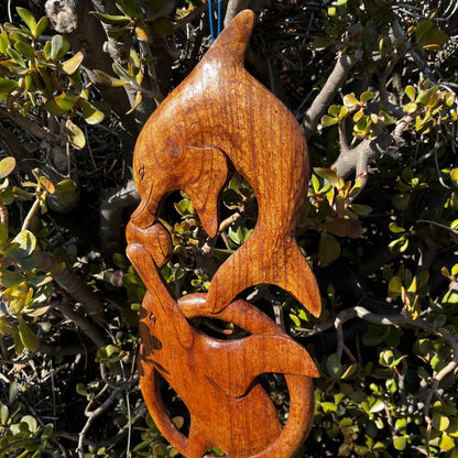Wooden dolphin plaque dolphin pod kissing and swimming together side vide of vertical hanging