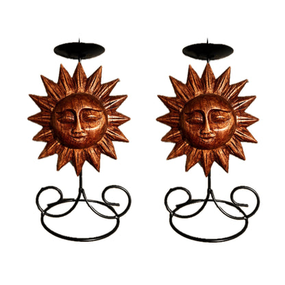 Handmade sun face candle holder, showcasing intricate craftsmanship, displayed on a white background. 