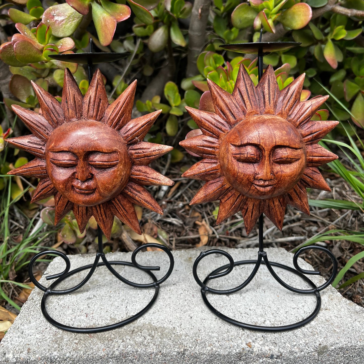 Sun candle holder, handcrafted from wood, showcasing intricate details, displayed on a white background. 