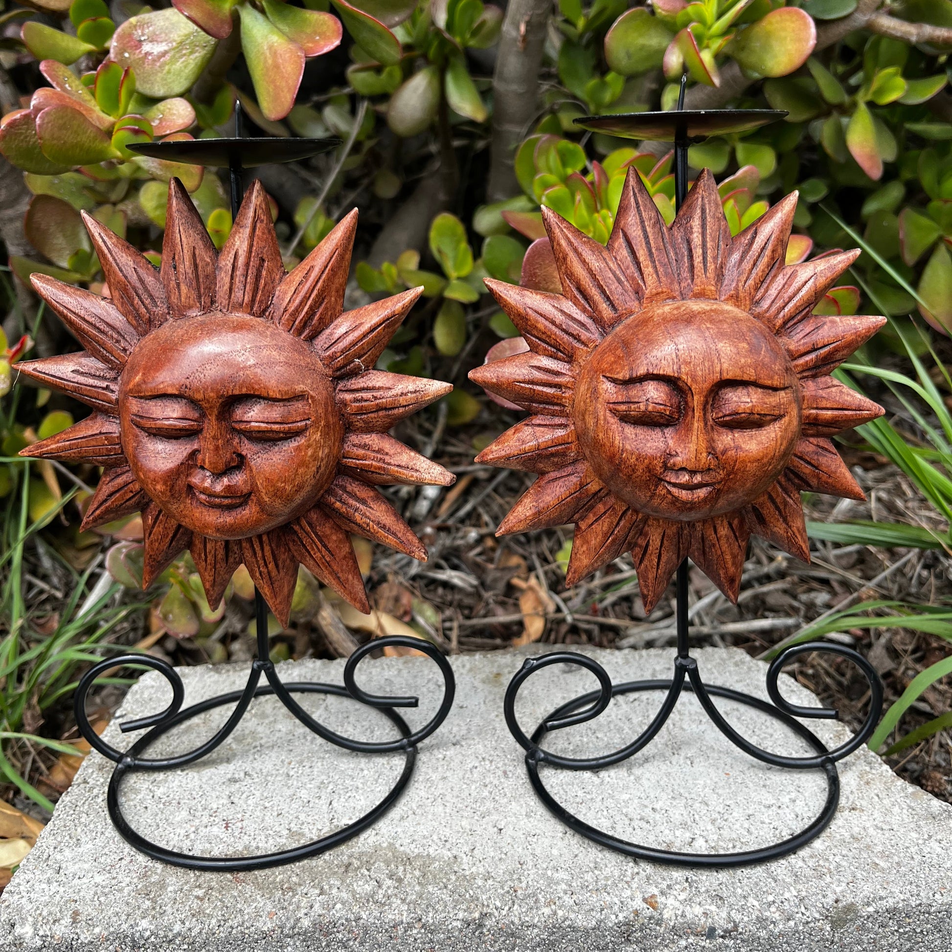 Sun candle holder, handcrafted from wood, showcasing intricate details, displayed on a white background. 